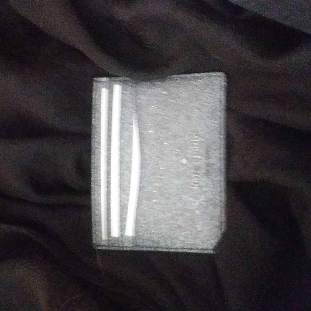 Kate Spade never used credit card holder silver